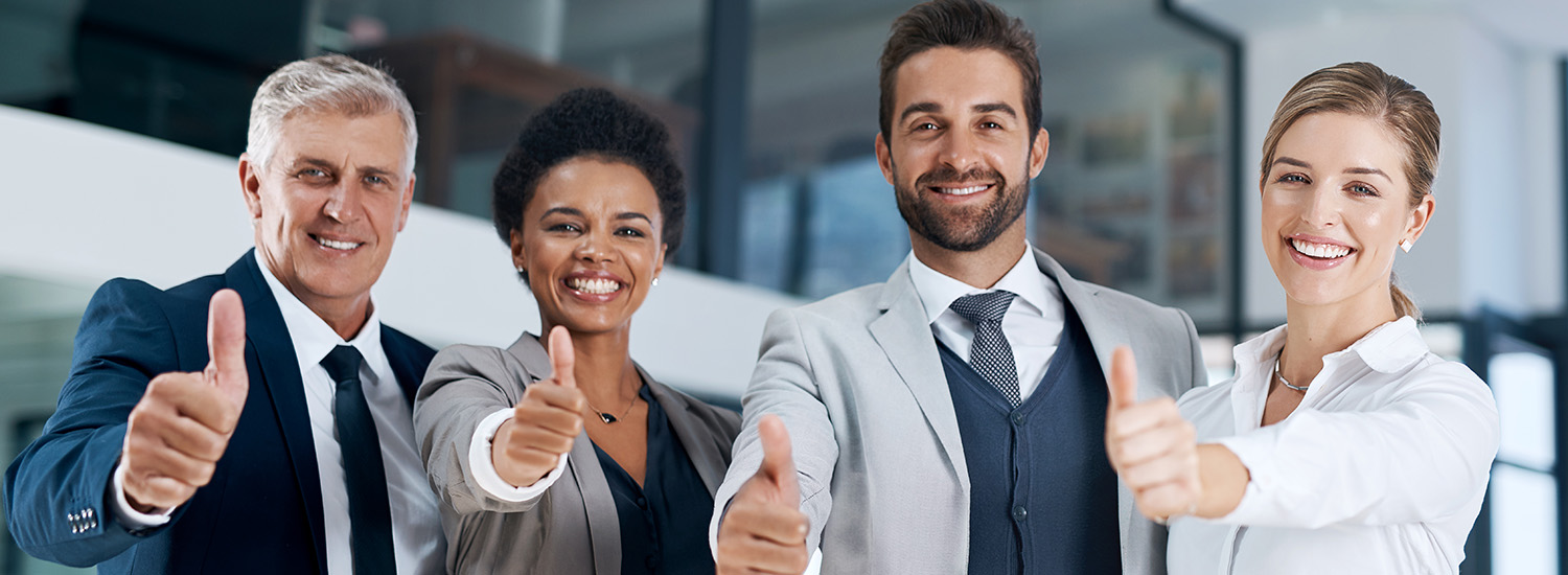 office employees showing thumbs up